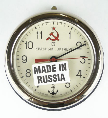 RED OCTOBER RUSSIAN CLOCK: RED OCTOBER RUSSIAN CLOCK Clock has Sticker made in Russia the Clock at 6 has an Anchor Approximately 7 Inches Diameter of the Face Like New Condition, SHIPPING $45 PLUS INS - this is not an electric 