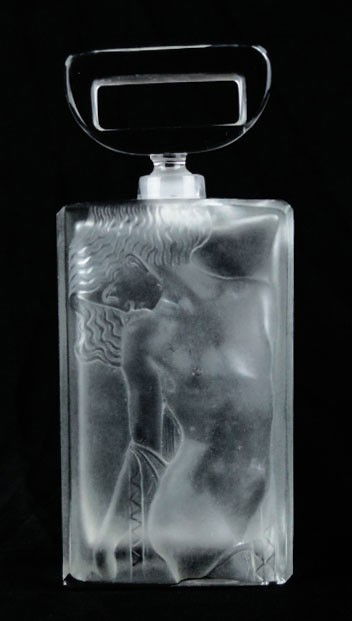 VINTAGE CZECH PERFUME BOTTLE NUDE RELIEF: VINTAGE CZECH PERFUME BOTTLE NUDE RELIEF Titled Ingrid Depicts a Nude in Relief Circa 1950's Measures Approximately 7-3/4 Inches Tall with Stopper Very Good Condition, SHIPPING $30 PLUS INS