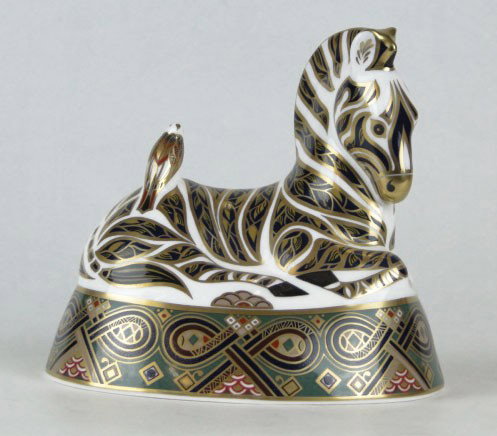 ROYAL CROWN DERBY PAPERWEIGHT FIGURINE "ZEBRA": ROYAL CROWN DERBY PAPERWEIGHT FIGURINE "ZEBRA" aprox 6" long signed base gold button, SHIPPING $25 PLUS INS