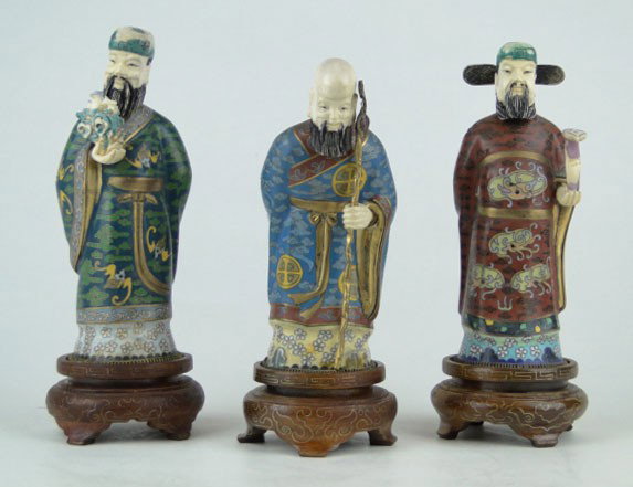 SET OF 3 CHINESE CLOISONNÉ & IVORY ELDERS: SET OF 3 CHINESE CLOISONNÉ & IVORY ELDERS Circa Early 20th Century Each Measures Approximately 5-1/2 Inches Tall Plus 1-1/2 Inch wooden Base all 3 Figurine have Ivory Heads and Hands Two of the 3 hav