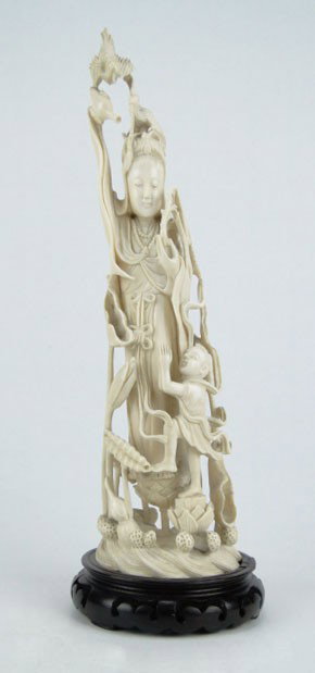 LARGE ANTIQUE CHINESE IVORY GROUPING: LARGE ANTIQUE CHINESE IVORY GROUPING Depicting Quan Yin with Young Child Birds on top of Quan Yins Head Carved From one Tusk Measures Approximately 11-1/2 Inches Tall Small Chips and Losses To Birds, 