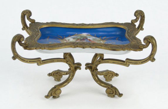 VINTAGE SEVRES PORCELAIN & BRONZE PEDESTAL TRAY: VINTAGE SEVRES PORCELAIN & BRONZE PEDESTAL TRAY Measures Approximately 6 Inches wide 3 Long Stands 4-1/4 Inches Tall, SHIPPING $30 PLUS INS