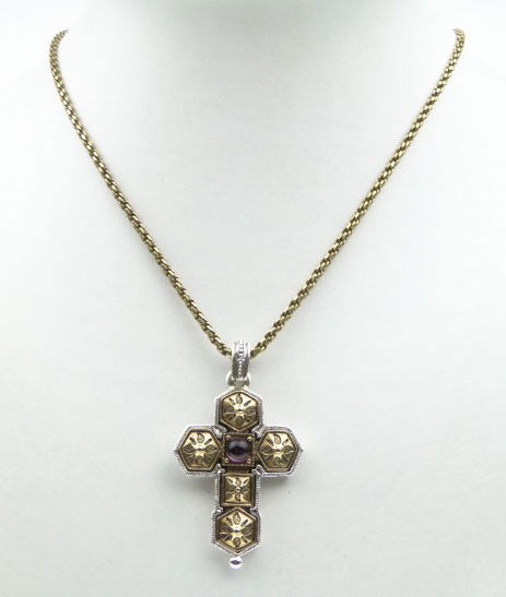 CROSS FROM THE VATICAN LIBRARY COLLECTION: CROSS FROM THE VATICAN LIBRARY COLLECTION beautiful cross gold and silver plated with small amethyst in center, has tag from Vatican, comes with gold plated chain, SHIPPING $20 PLUS INS