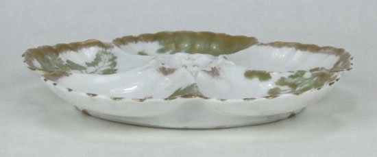 ANTIQUE LIMOGES PORCELAIN OYSTER PLATE: ANTIQUE LIMOGES PORCELAIN OYSTER PLATE Circa 1900's 5 Oyster Compartments Painted in Green & Gold floral Design Red mark T&V to Base 8 Inches in Diameter, SHIPPING $25 PLUS INS