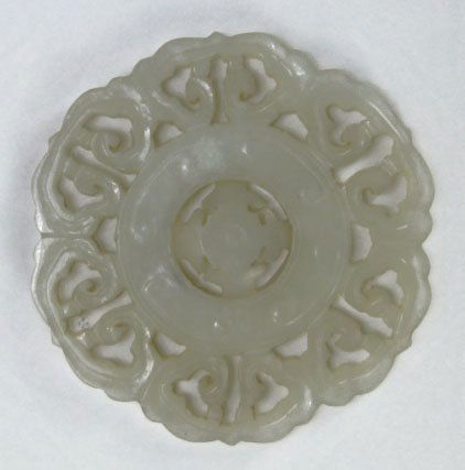 ANTIQUE CHINESE MECHANICAL WHITE JADE DISK: ANTIQUE CHINESE MECHANICAL WHITE JADE DISK Center Disk Rotates Floral Display Circa Early 20th Century Measures Approximately 2 Inches In Diameter, SHIPPING $20 PLUS INS