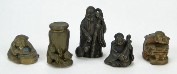 LOT OF 5 VINTAGE JAPANESE BRONZE OPIUM WEIGHTS: LOT OF 5 VINTAGE JAPANESE BRONZE OPIUM WEIGHTS One Depicts a Two Men Holding Palace Size Vase , Another a Nobleman Holding a large Staff, Man Playing a Sitar, Man Playing a Drum, and a Old man Hunched