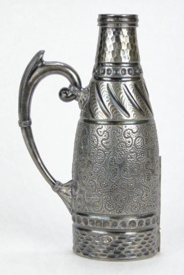 ANTIQUE HAND CHASED KORFF 1881 WINE CASKET: ANTIQUE HAND CHASED KORFF 1881 WINE CASKET Antique Hand Chased 1881 Wine Casket by Moritz Korff of the Meridian Silver Co of Connecticut Measures Approx 9-1/2 Inches Tall in Very Good Condition, SHIPP