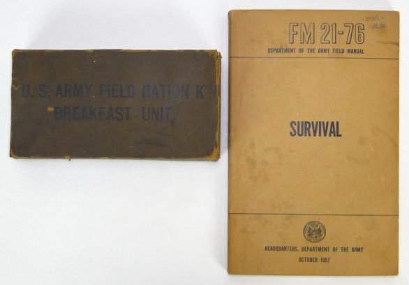 2 ANTIQUE US ARMY ITEMS: 2 ANTIQUE US ARMY ITEMS Consisting of an Unopened World War 2 US Army Field Ration Breakfast Packaged by The Cracker jack Co of Chicago Along with a 1957 Army Field Manual on Survival, SHIPPING $25 PL