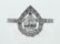 65: 18KT WHITE GOLD & PEAR SHAPED DIAMOND RING