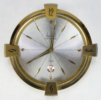 DUNHILL 8 DAY CALENDAR CLOCK: DUNHILL 8 DAY CALENDAR CLOCK Solid Brass in Excellent Working Condition Measures Approximately 3-1/2 Inches in Diameter, SHIPPING $20 PLUS SHIPPING