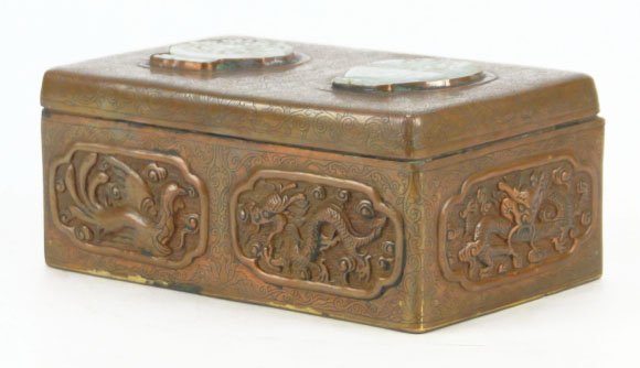 ANTIQUE CHINESE COPPER & JADE LIDDED BOX: ANTIQUE CHINESE COPPER & JADE LIDDED BOX With Dragon & Bird of paradise Motif. 2 Carved jade Pendants Inlaid to Top. NOTE Hinge Broken Measures Approximately 6 Inches Long 4 Inches Wide, SHIPPING $25 
