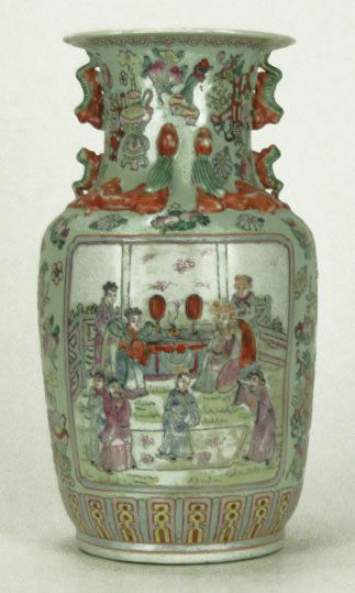 ANTIQUE CHINESE FAMILLE HAND PAINTED VASE: ANTIQUE CHINESE FAMILLE HAND PAINTED VASE with Fish Handles. Adorned with Court Yard Scene & Imperial Scene to Back. Floral Design on Light Green Ground with Koi Fish Extended From Neck of Vase Signed