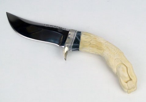 IVORY CARVED HANDLE EAGLES TALON HOLDING AN EGG KN: IVORY CARVED HANDLE EAGLES TALON HOLDING AN EGG KNIFE Ivory Carved Handle Eagles Talon Holding an Egg Knife with Onyx Spacer in Case Unsigned Blade Overall Measures 10-1/4 Inches Ivory Carving 5 Inche