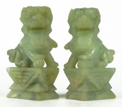 PAIR CHINESE JADE FOO DOG FIGURINES: PAIR CHINESE JADE FOO DOG FIGURINES Both Facing Each Other and Each Measures Approximately 5-3/4 Inches Tall 2-7/8 Inches Wide 2 Inches Deep in Fitted Box, SHIPPING $40 PLUS INS
