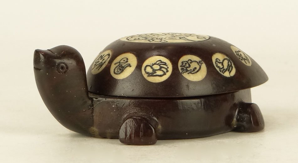 VINTAGE IVORY & WOOD TURTLE COMPASS: VINTAGE IVORY & WOOD TURTLE COMPASS In the Shape of a Turtle Indicating in Bone The Chinese New Year Symbols and the Top is they Year it was made has Movable Top to Show Compass, SHIPPING $20 PLUS INS