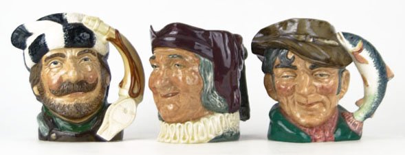 THREE LARGE ROYAL DOULTON TOBY MUGS: THREE LARGE ROYAL DOULTON TOBY MUGS TO INCLUDE "The Poacher" Measures Approximately 6 3/4 Inches Tall, "The Trapper" Measures Approximately 7 Inches Tall From the Canadian Centennial Series 1867-1967,