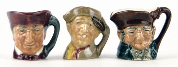 THREE THIMBLE SIZE VINTAGE ROYAL DOULTON TOBY MUGS: THREE THIMBLE SIZE VINTAGE ROYAL DOULTON TOBY MUGS TO INCLUDE Assorted Characters Measuring Approximately 1 1/4 Inches Tall WE WILL SHIP THIS ITEM FOR $25 PLUS INSURANCE