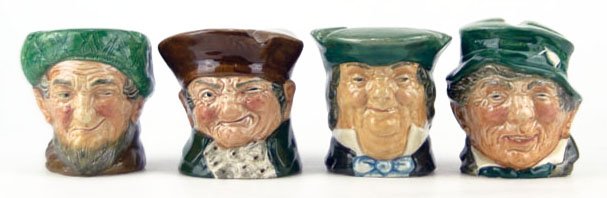 FOUR SMALL VINTAGE ROYAL DOULTON TOBY MUGS: FOUR SMALL VINTAGE ROYAL DOULTON ASHTRAYS TO INCLUDE "Paddy", "Old Charley", "Mr. Brown", & "Owd Mac" All Measures Approximately 3 Inches Tall WE WILL SHIP THIS ITEM FOR $25 PLUS INSURANCE
