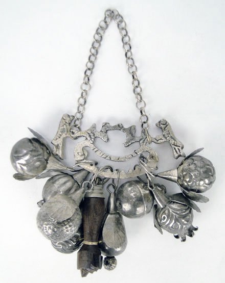 RARE VINTAGE MID EASTERN SLAVE BRACELET: RARE VINTAGE MID EASTERN SLAVE BRACELET Measures Approximately 8 Inches Long with 8 Silver Hand Hammered Balls and a Wooden Fist on a Silver Colored Chain WE WILL SHIP THIS ITEM FOR $20 PLUS INSURANCE