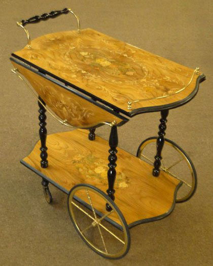 EXQUISITELY VENEERED ITALIAN TEA CART: EXQUISITELY VENEERED ITALIAN TEA CART Italian Drop Leaf Tea Cart Beautiful Veneers to Top and Lower Shelf. All Original Brass Hardware. Clear Liquored to Glass like Finish. Measures Approximately 30 3