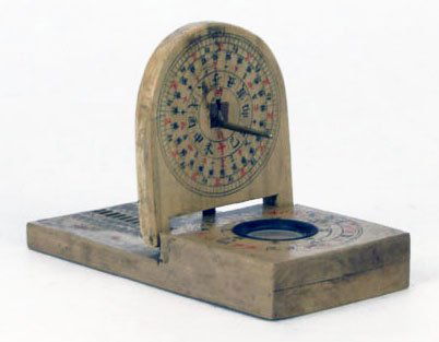 ANTIQUE CHINESE SUNDIAL: ANTIQUE CHINESE SUNDIAL with Compass Calligraphy on Front and Back Measures Approximately 4 1/2 Inches Tall by 2 Inches Wide WE WILL SHIP THIS ITEM FOR $30 PLUS INSURANCE