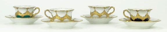 SET OF FOUR VINTAGE MEISSEN DEMI TASSE CUPS AND SA: SET OF FOUR VINTAGE MEISSEN DEMI TASSE CUPS AND SAUCERS Saucers Measure Approximately 4 Inches In Diameter with Blue Crossed Swords Under Glaze to Base One Set with Green Accent and One Set with Cobal