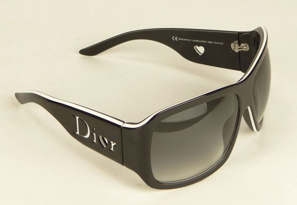 PAIR OF DIOR DESIGNER SUNGLASSES NEW IN CASE: PAIR OF DIOR DESIGNER SUNGLASSES NEW IN CASE black with white Dior WE WILL SHIP THIS ITEM FOR $25 PLUS INSURANCE