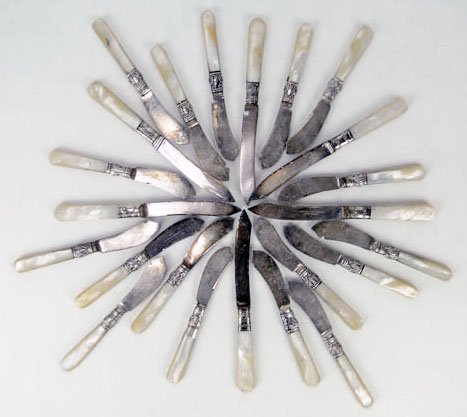 LOT OF TWENTY ANTIQUE MOTHER OF PEARL HANDLED BUTTER KN: LOT OF TWENTY ANTIQUE MOTHER OF PEARL HANDLED BUTTER KNIVES Each Approximately 6 Inches Long. Mid Century. In Excellent Condition WE WILL NOT SHIP THIS ITEM BUT CAN RECOMMEND A SHIPPER FOR YOU