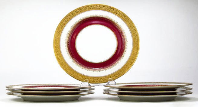 SEVEN VINTAGE SELB GERMAN DINNER PLATES: SEVEN VINTAGE SELB GERMAN DINNER PLATES Each Measures Approximately 10-3/4" in Diameter. Cranberry Trim with Antique Gold Boarder. Made by the H&C Selb Company Bavaria. WE WILL NOT SHIP THIS ITEM BUT