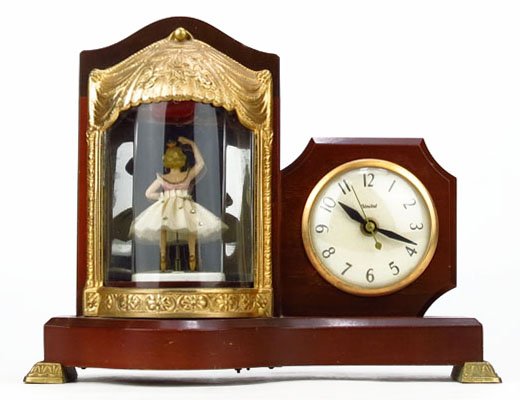 1940'S UNITED TABLE CLOCK WITH BALLERINA: 1940'S UNITED TABLE CLOCK WITH BALLERINA Measures Approximately 10-1/2" Tall by 10" Wide. In Working Condition. WE WILL NOT SHIP THIS ITEM BUT CAN RECOMMEND A SHIPPER FOR YOU