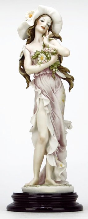GIUSEPPE ARMANI FIGURINE TITLED "DAISY": GIUSEPPE ARMANI FIGURINE TITLED "DAISY" #202E. Measures Approximately 13-1/2" Tall Plus 1-1/2" Base. Depicting a Woman Holding a Bouquet of Daisy's. Comes in Original Box WE WILL NOT SHIP THIS ITEM BU