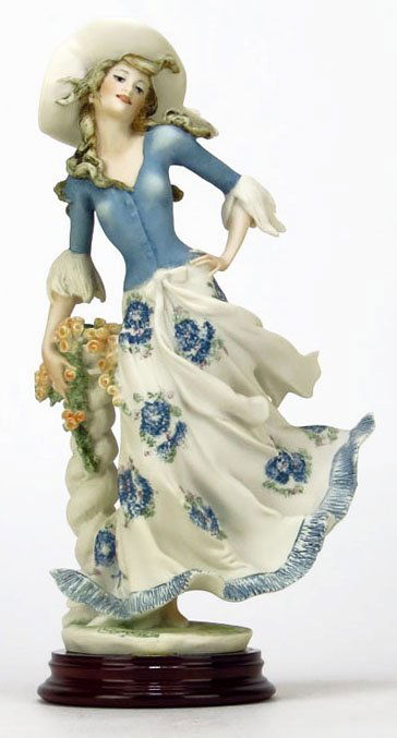 GIUSEPPE ARMANI FIGURINE TITLED "LADY JANE": GIUSEPPE ARMANI FIGURINE TITLED "LADY JANE" #0390-C. Measures Approximately 9-12/2" Tall on a 1/2" Base. Depicting a Woman in Traditional Dress. Comes in Original Box WE WILL NOT SHIP THIS ITEM BUT CA