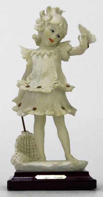 GIUSEPPE ARMANI TITLED "BUTTERFLY GIRL": GIUSEPPE ARMANI TITLED "BUTTERFLY GIRL" #1139-F. Measures Approximately 7-1/2" Tall on a 1" Base. Depicting a Girl with a Butterfly on Her Hand. Comes in Original Box. WE WILL NOT SHIP THIS ITEM BUT C