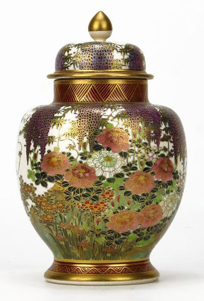 ANTIQUE SATSUMA COVERED GINGER JAR: ANTIQUE SATSUMA COVERED GINGER JAR Circa 1910. Measures Approximately 9-1/2" Tall. With Floral Decoration Throughout. Signed to Base in Red. In Excellent Condition WE WILL NOT SHIP THIS ITEM BUT CAN R