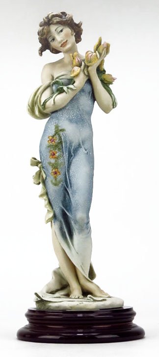 GIUSEPPE ARMANI TITLED "IRIS": GIUSEPPE ARMANI TITLED "IRIS" #628-E. Measures Approximately 12-1/2" Tall, Plus Base. New in Box with Papers. WE WILL NOT SHIP THIS ITEM BUT CAN RECOMMEND A SHIPPER FOR YOU