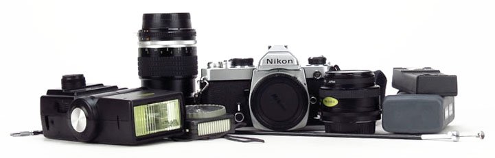 NIKON 35MM SLR AND ACCESSORY SET: NIKON 35MM SLR AND ACCESSORY SET To Include a Nikon FM2 35mm SLR, a Nikon FM 35mm SLR, a Nikkor 105mm Lens, a 55mm Nikkor Lens, a 50mm Nikkor Lens, a 35mm Nikkor Lens, a 200mm Nikkor Zoom Lens, and a 