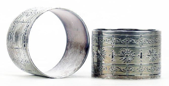 PAIR OF ANTIQUE ENGLISH STERLING NAPKIN RINGS: PAIR OF ANTIQUE ENGLISH STERLING NAPKIN RINGS Total Weight 8ozt. Each Measures Approximately 1-1/2" in Diameter WE WILL SHIP THIS ITEM FOR $20 PLUS INSURANCE