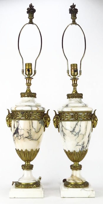 PAIR OF ANTIQUE MARBLE AND BRONZE LAMPS: PAIR OF ANTIQUE MARBLE AND BRONZE LAMPS Each Measures Approximately 34" From Base to Finial. French in Origin, with Rams Head Handles. Excellent Condition. WE WILL NOT SHIP THIS ITEM BUT CAN RECOMMEND