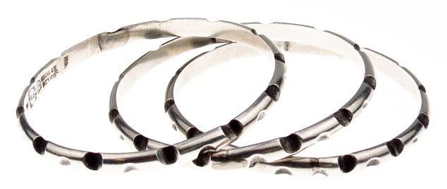 THREE STERLING SILVER BANGLE MARKED HILDA TASCO MEXICO: THREE STERLING SILVER BANGLE MARKED HILDA TASCO MEXICO Attributed to Antonio Pineda Each Bangle Measures Approximately 2-1/2" in Diameter. With a Total Weight of 1.90ozt WE WILL SHIP THIS ITEM FOR $20
