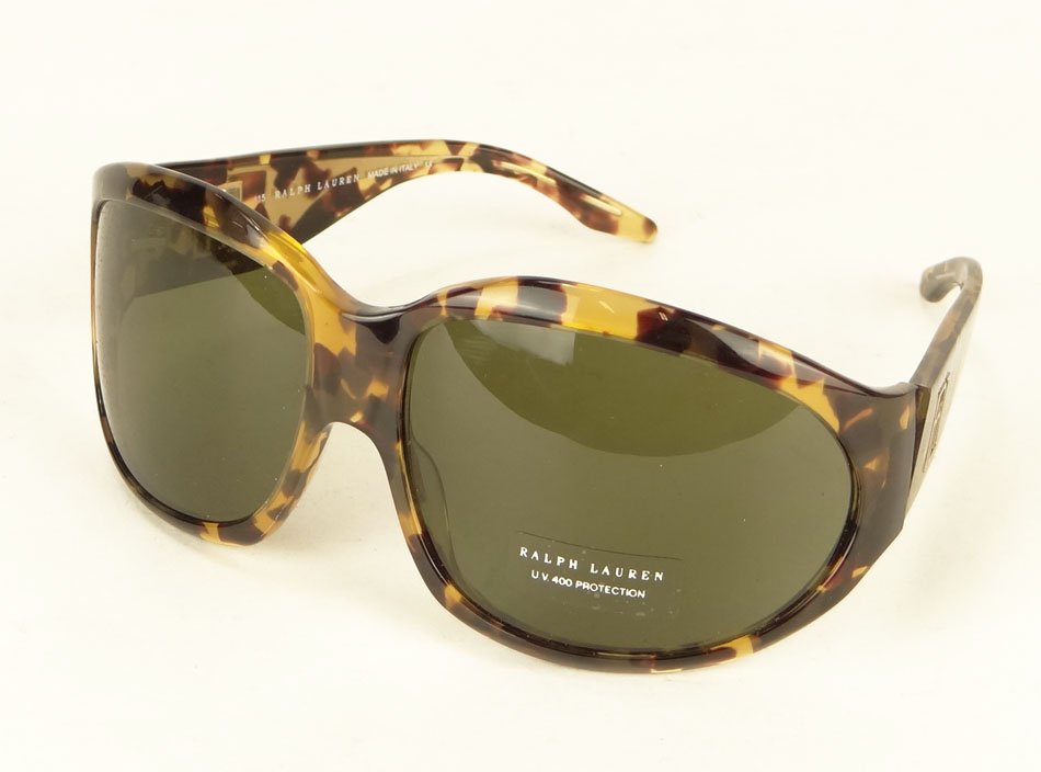 PAIR OF RALPH LAUREN DESIGNER SUNGLASSES NEW IN CASE: PAIR OF RALPH LAUREN DESIGNER SUNGLASSES NEW IN CASE In a faux Tortoise Shell Pattern, Comes with case WE WILL SHIP THIS ITEM FOR $30 PLUS INSURANCE