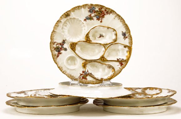 ELEGANT SET OF SIX ANTIQUE LIMOGES OYSTER PLATES: ELEGANT SET OF SIX ANTIQUE LIMOGES OYSTER PLATES Each Measures Approximately 8-1/4" in Diameter with Lovely Floral Spray Design and Antique Gold Trim. Imported by Haviland & Co for Wright & Tyandle Co