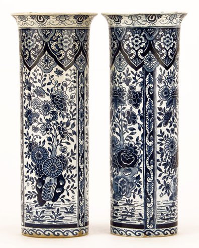PAIR OF ANTIQUE DELFT CYLINDRICAL VASES: PAIR OF ANTIQUE DELFT CYLINDRICAL VASES Each Measures Approximately 8-1/2" Tall with Beautiful Floral Design. Signed Delft Under glaze to Base. Circa 1920's WE NOT SHIP THIS ITEM BUT CAN RECOMMEND A S