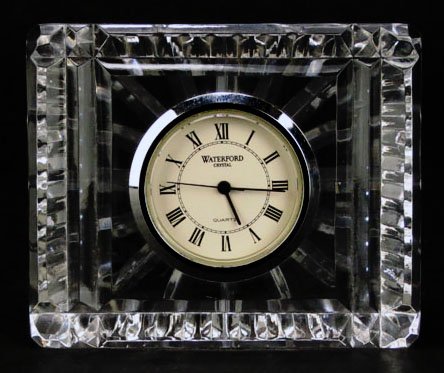 SMALL WATERFORD CRYSTAL CLOCK: SMALL WATERFORD CRYSTAL CLOCK Measures Approximately 2-1/2" Tall by 3" Wide. In Very Good Condition WE WILL SHIP THIS ITEM FOR $20 PLUS INSURANCE