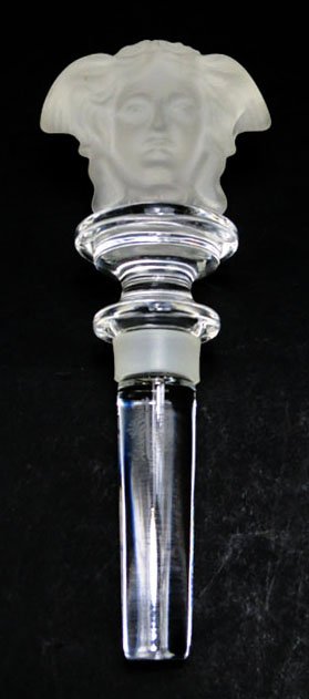 VERSACE/ROSENTHAL CRYSTAL STOPPER: VERSACE/ROSENTHAL CRYSTAL STOPPER with the Versace Logo. Signed to Base. Measures Approximately 5" Long. Excellent Condition WE WILL SHIP THIS ITEM FOR $20 PLUS INSURANCE