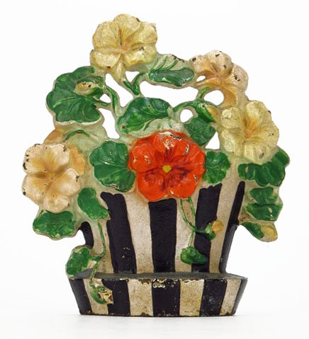 ANTIQUE CAST IRON HAND PAINTED FLORAL DOORSTOP: ANTIQUE CAST IRON HAND PAINTED FLORAL DOORSTOP Measures Approximately 7-1/4" Tall. In The Form of a Floral Basket. Circa 1920's-1930's. Light Paint Loss, Otherwise Good Condition. WE WILL NOT SHIP THI