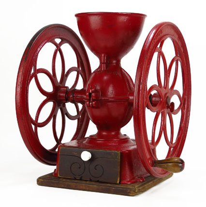 ANTIQUE LARGE CAST IRON COFFEE GRINDER: ANTIQUE LARGE CAST IRON COFFEE GRINDER Measures Approximately 17" Tall by 13" Wide. Heavy Cast Iron Coffee Grinder Made in 1873 by the Enterprise Co of Philadelphia. Still in Excellent Working Conditi