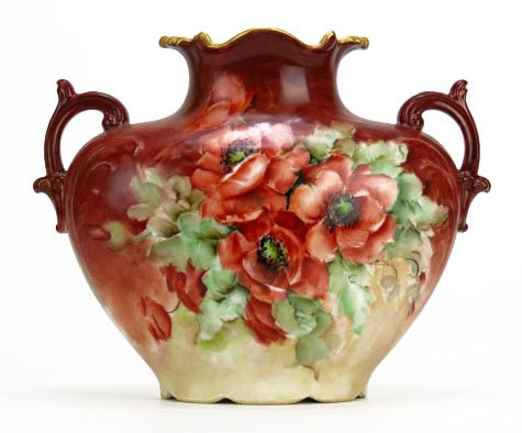 ANTIQUE LIMOGES HAND PAINTED PILLOW VASE: ANTIQUE LIMOGES HAND PAINTED PILLOW VASE by the Jean Puoyett Co. Measures Approximately 8" Tall. Floral Design on Light Brown Ground. Circa 1915. Very Good Condition WE WILL NOT SHIP THIS ITEM BUT CAN