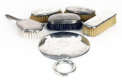 LOT OF 5 STERLING SILVER BRUSHES & 1 MIRROR: LOT OF 5 STERLING SILVER BRUSHES & 1 MIRROR Hand mirror measures 8" tall We will not ship this item. We will happily recommend a list of outside vendors upon request