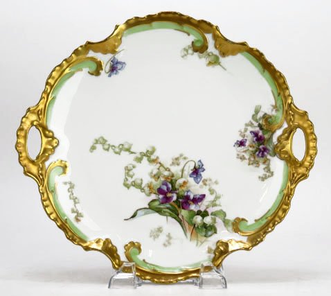 ANTIQUE CORONET LIMOGES HAND PAINTED TRAY: ANTIQUE CORONET LIMOGES HAND PAINTED TRAY Measures 11" handle to handle hand painted violets on white ground antique gold rim. Very good condition We will not ship this item. We will happily recommend