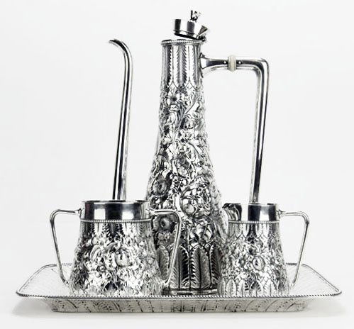 Fine Gorham Sterling Silver 4 Piece Tea Set with: Fine Gorham Sterling Silver 4 Piece Tea Set with Repousse Roses. Lid on Teapot is Bent Otherwise in Good Condition. Teapot Measures 12" Tall by 7" Wide. Tray Measures 11-1/2" Square. Tea Set Weighs Ap